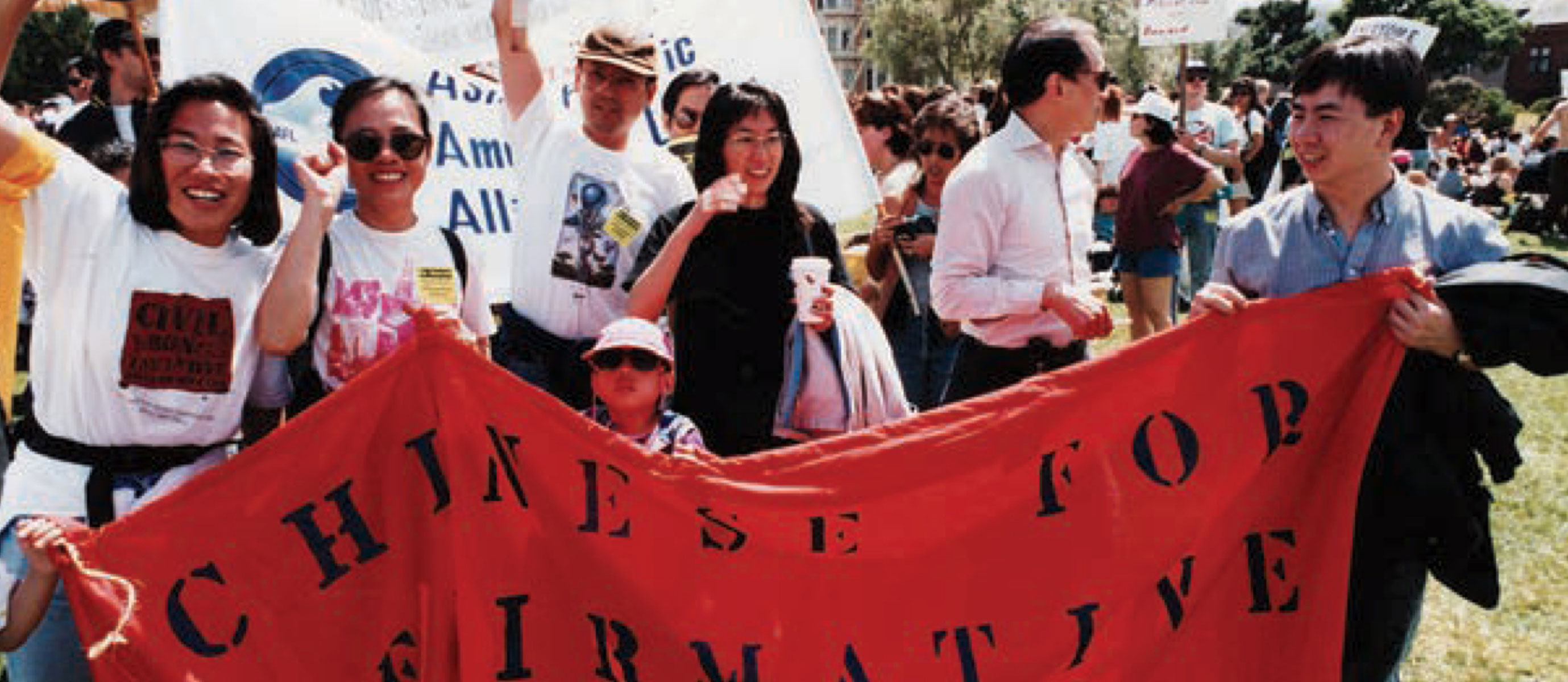 people holding a banner