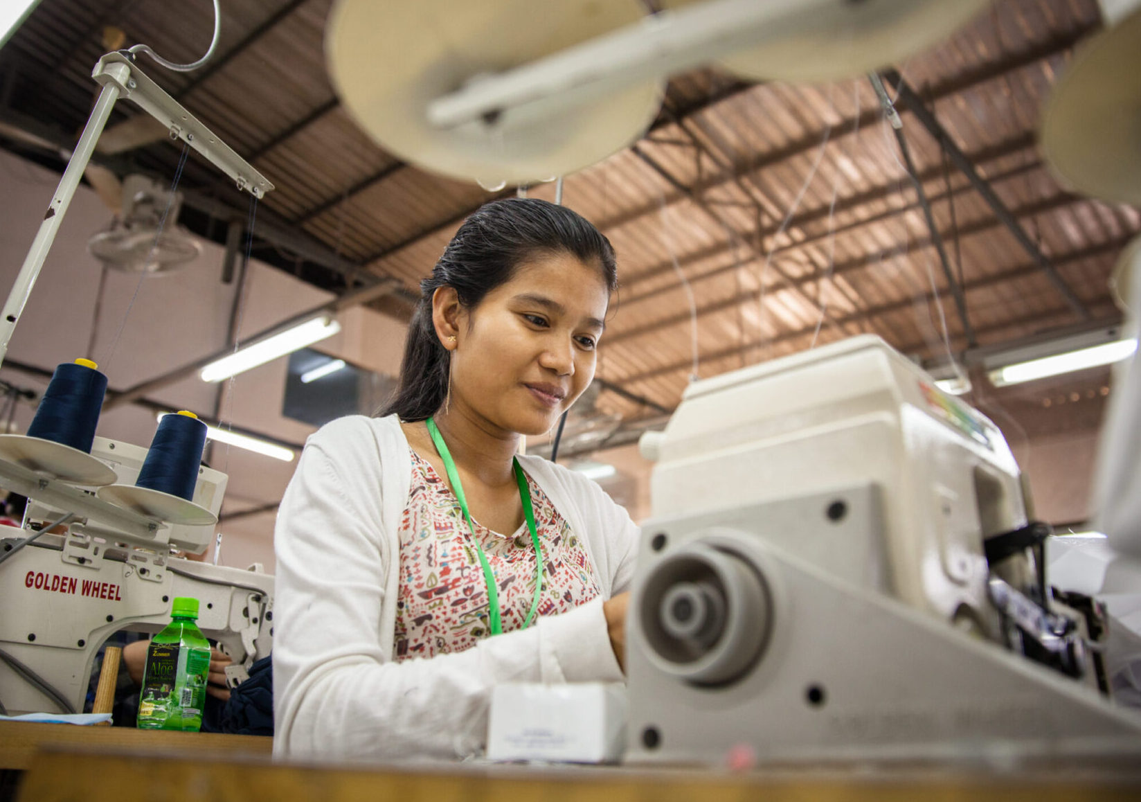 Eight months pregnant Line Leader, Maly Thorn, at work. “Before joining CARE’s training, I didn’t know anything about contraceptive methods, that’s why I got pregnant twice!” She says. “But now, after I have my second baby, I will start protecting myself”. Phnom Penh, Cambodia. Mar. 13, 2018. © CARE / Erika Piñeros