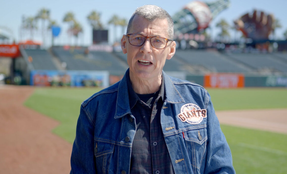 LS&Co. CEO Chip Bergh stands in Oracle Park in a Giants branded trucker jacket