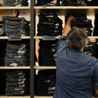 back of employee staffing a Levi's® store