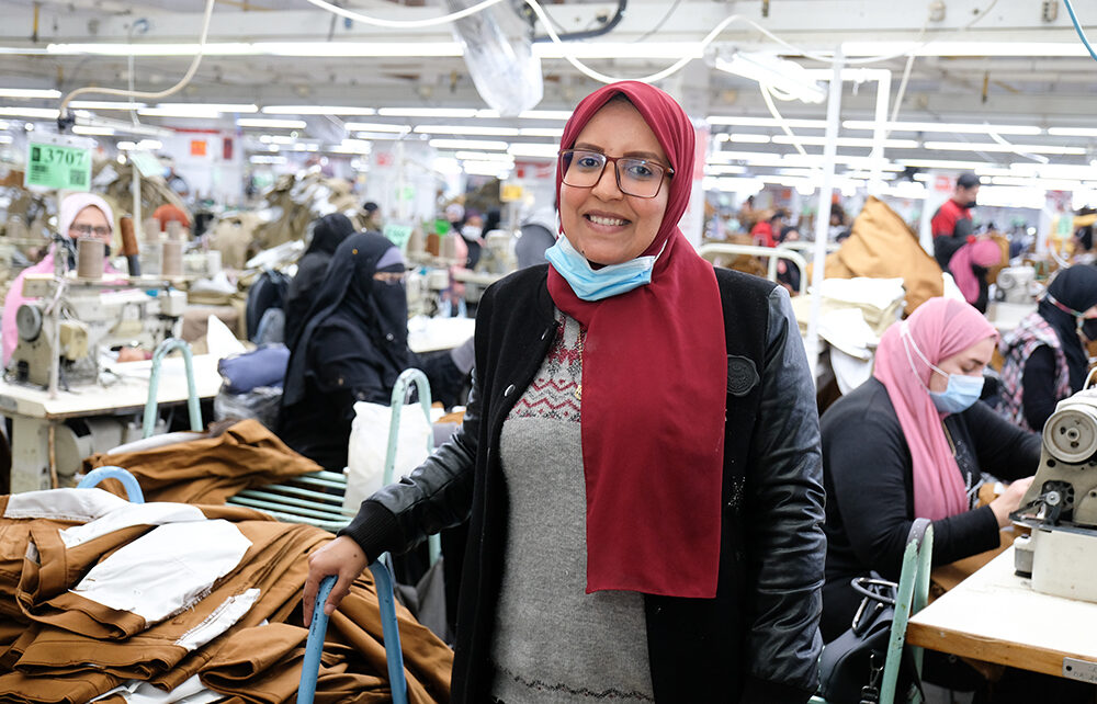 ALysayda Abdelrahim poses in a LS&Co. manufacturing facility