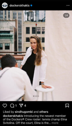 A screenshot of a Dockers® Instagram post. The photo is of tennis player Elina Svitolina in a white button down shirt over a black shirt. Her hand is leaning on a white stool and there is a person in the foreground facing her. Caption reads "Introducing the newest member of the Dockers® Crew roster: tennis champ Elina Svitolina. Off the court, Elina is the founder behind the Elina Svitolina Foundation—an inspiring charitable initiative in Ukraine committed to nurturing sports and tennis talent in the nation. With her optimistic outlook and passion for her craft, she perfectly embodies all that the Crew stands for. Let’s give it up for the newest member of the Dockers® family 👏👏👏"