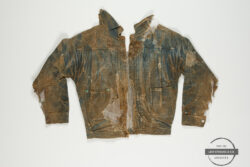 A distressed Levi's® Triple Pleat Blouse is photographed on a grey background. The Levi's® Archives logo image is overlayed on the bottom right corner.