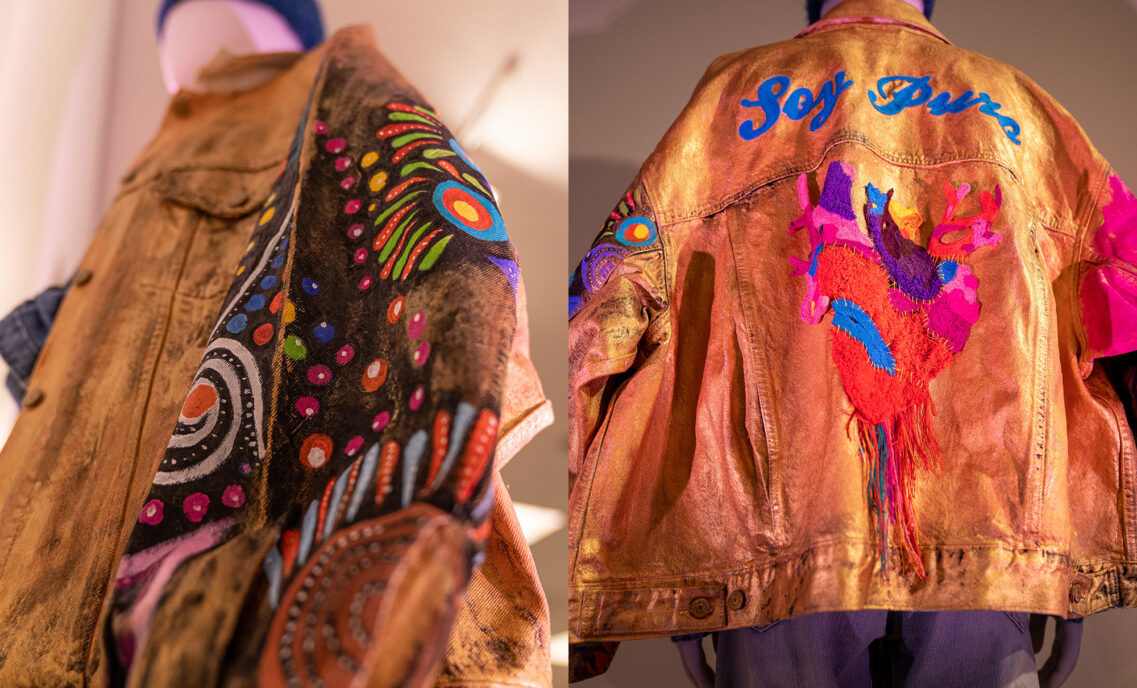 Left: the sleeve of a custom Trucker jacket designed for LS&Co.'s annual Seen & Heard women's summit. Right: a photo of the back of the jacket. The jacket is gold and features a painting of a heart on the back.