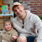 The new CEO of Beyond Yoga®, Justin Brandt, poses with his daughter.