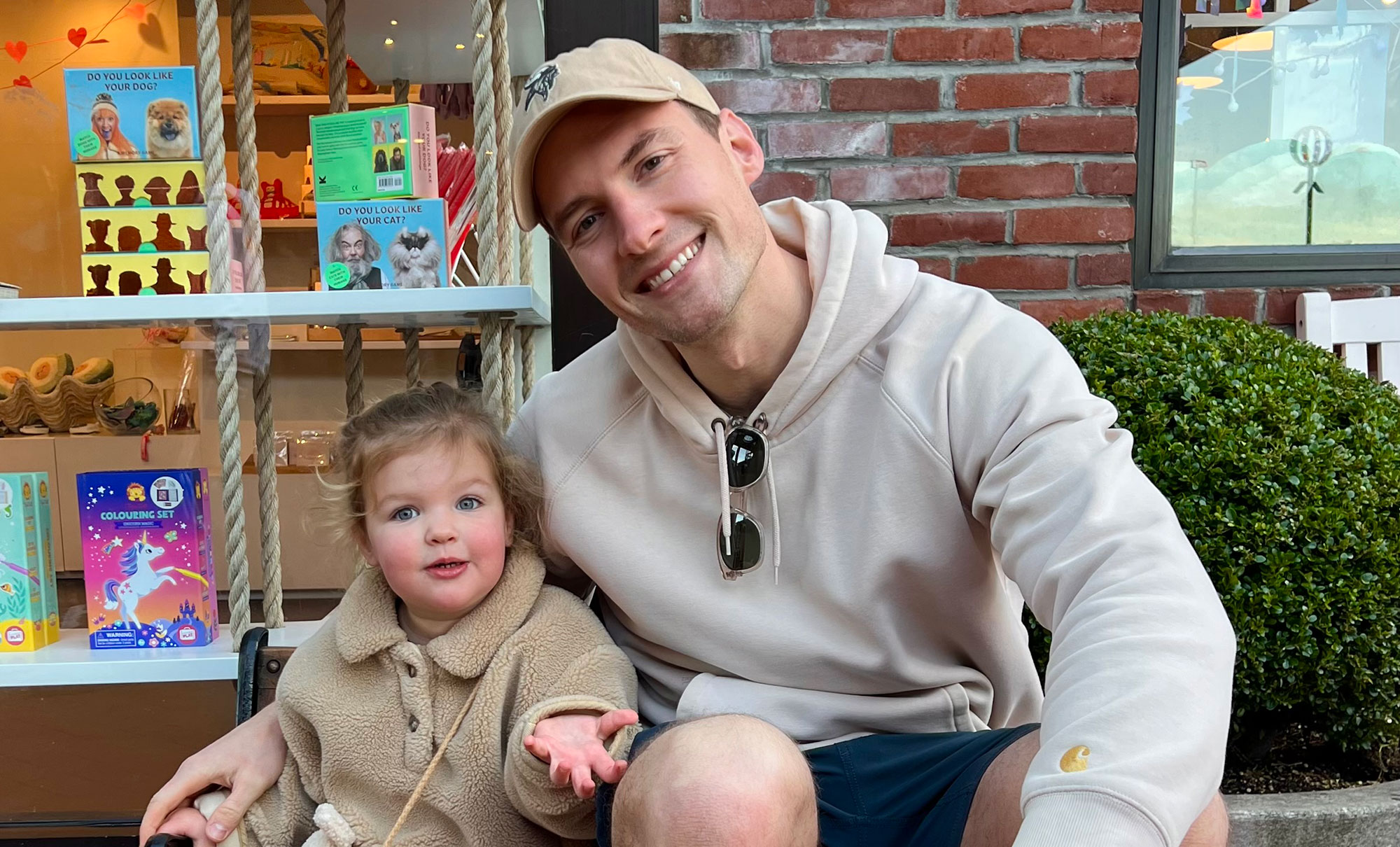 The new CEO of Beyond Yoga®, Justin Brandt, poses with his daughter.