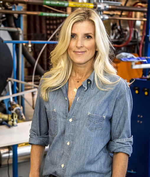 A portrait of Karyn Hillman. She is wearing a blue button up Levi's® denim shirt.