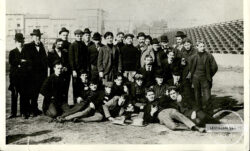 A black and white image of early LS&Co. employees standing on a baseball field