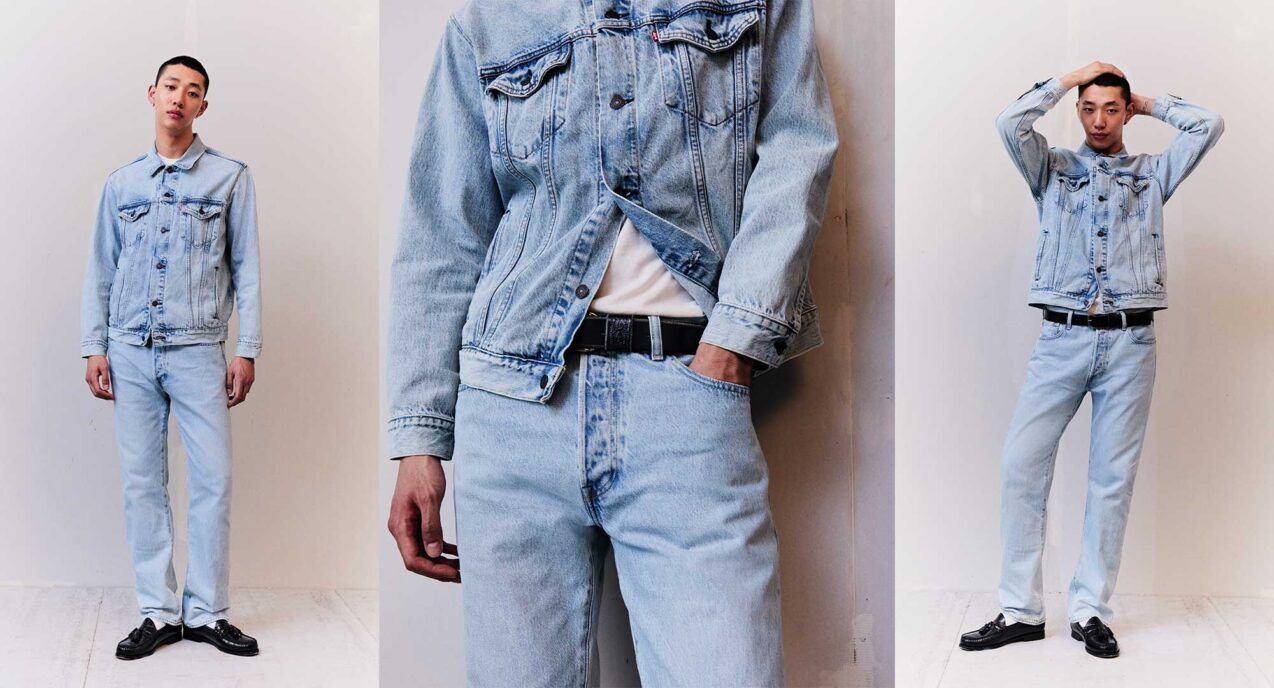 Left: a model stands against a grey backdrop with their hands by their side, wearing a light wash Levi's® denim Trucker jacket and matching Levi's® 501® Thermodapt jeans. Middle: A zoomed in cropped image of the model with a hand in their pocket. Right: the model stands with their hands behind their head.