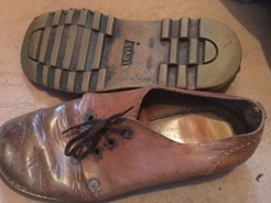 a pair of brown leather Levi's shoes