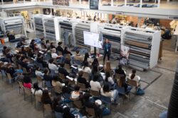 A group of San Francisco high schoolers sit facing an instructor from Discovery Education as part of a hands-on workshop for the Levi's® Wear Longer Project at the Levi Strauss & Co. Eureka Innovation Lab