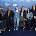 Eight Levi Strauss & Co. employees pose on the "denim carpet" at the National Gallery of Victoria Gala