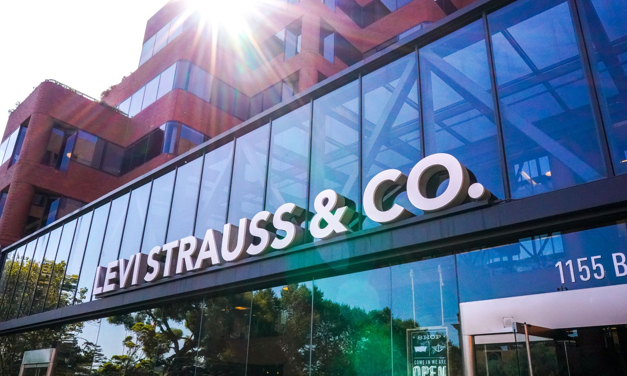 A photo of the exterior of the Levi Strauss & Co. headquarters, with the logo Levi Strauss & Co. on the side of the building